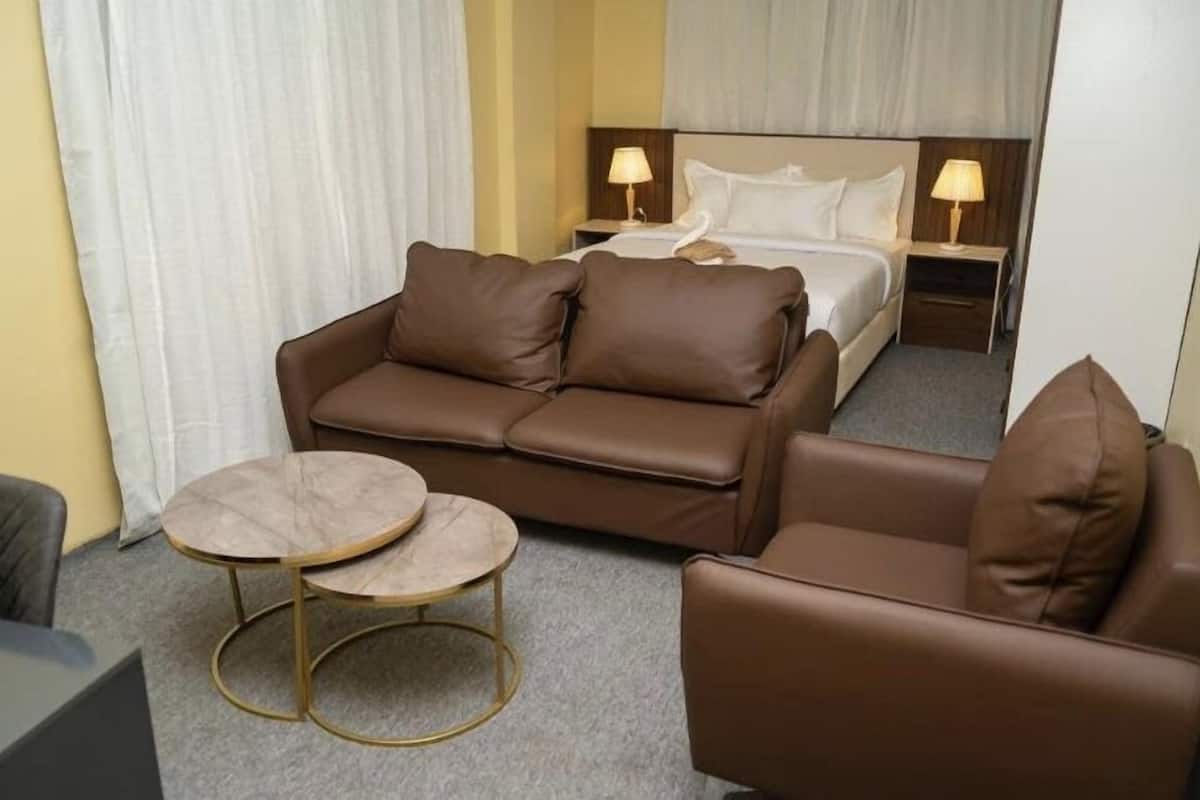 Luxury Studio Suite, City View | In-room safe, blackout curtains, iron/ironing board, free WiFi