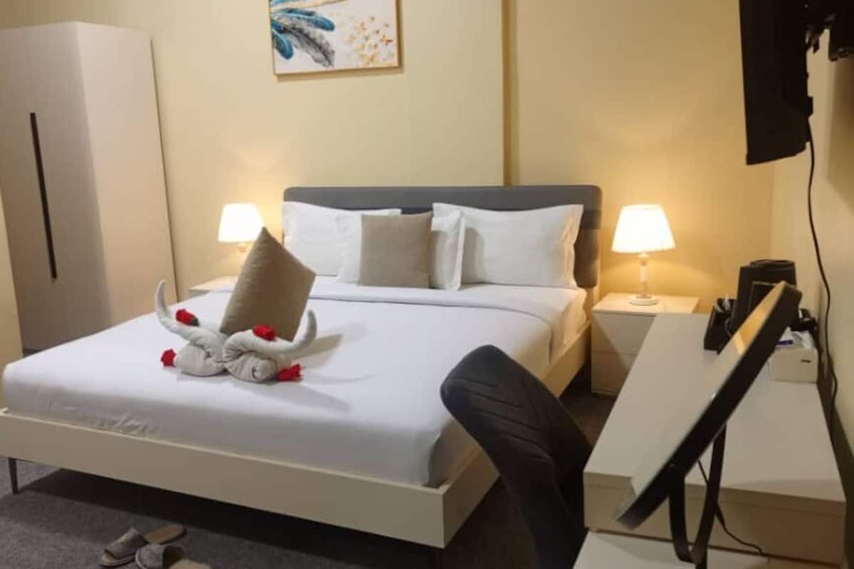 Deluxe Room | In-room safe, blackout curtains, iron/ironing board, free WiFi