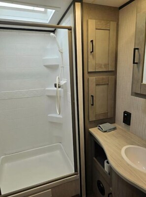 Hair dryer, towels, soap, toilet paper