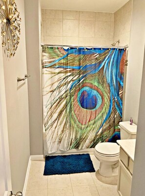 Shower, hair dryer, towels, soap