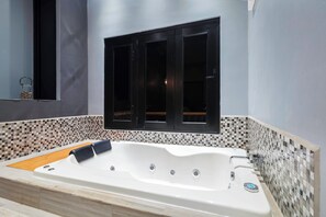 Shower, towels, soap, toilet paper