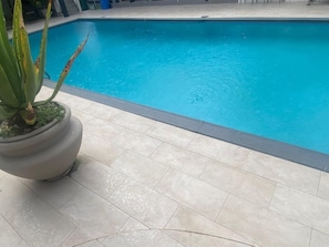 Outdoor pool, pool umbrellas, sun loungers