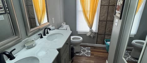 Shower, towels, soap, toilet paper