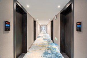 Premium bedding, pillow-top beds, free minibar, desk