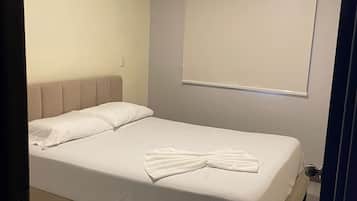 Deluxe Apartment, Balcony, Courtyard View | 3 bedrooms, blackout drapes, soundproofing, iron/ironing board