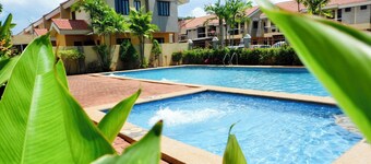 Boho Chic 2-bedroom House in Puerto Princesa with Pool Access and Workspace