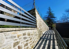 Walk through the historic stone walls and along the well-maintained pathway.