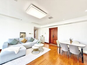 Luxury Apartment, 3 Bedrooms, Non Smoking, City View | Living area | 59-inch LCD TV with digital channels