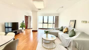 Luxury Apartment, 3 Bedrooms, Non Smoking, City View | Living area | 59-inch LCD TV with digital channels