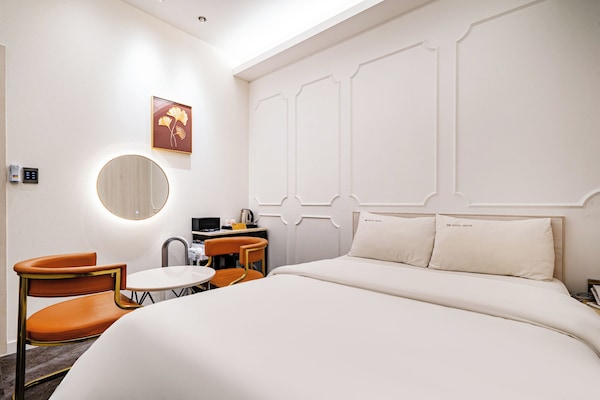 Standard Room | Premium bedding, down duvets, memory-foam beds, desk