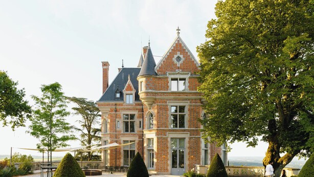 A large, historic building with a prominent tower, surrounded by well-maintained gardens and a clear view of the landscape. - Les Hauts de Sancerre   (Sancerre)