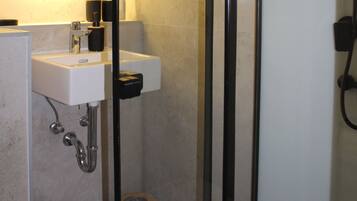 Comfort Single Room | Bathroom | Shower, hair dryer, towels, soap