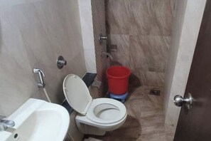 Shower, bidet, towels, soap