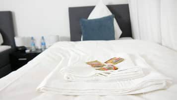 4 bedrooms, iron/ironing board, WiFi, bed sheets