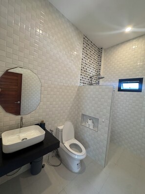 Shower, hair dryer, towels, soap