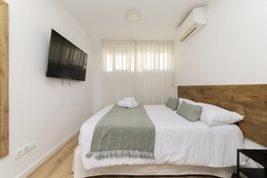 Fer et planche à repasser, Wi-Fi gratuit, draps fournis