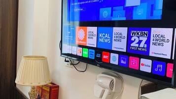 Shower, rainfall showerhead, designer toiletries, hair dryer