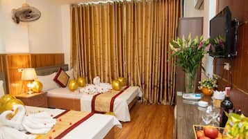 Select Comfort beds, free minibar, desk, laptop workspace