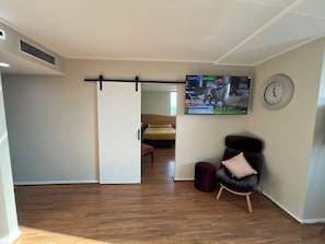Enjoy a comfortable stay in this well-appointed room featuring a bed, television, and window.