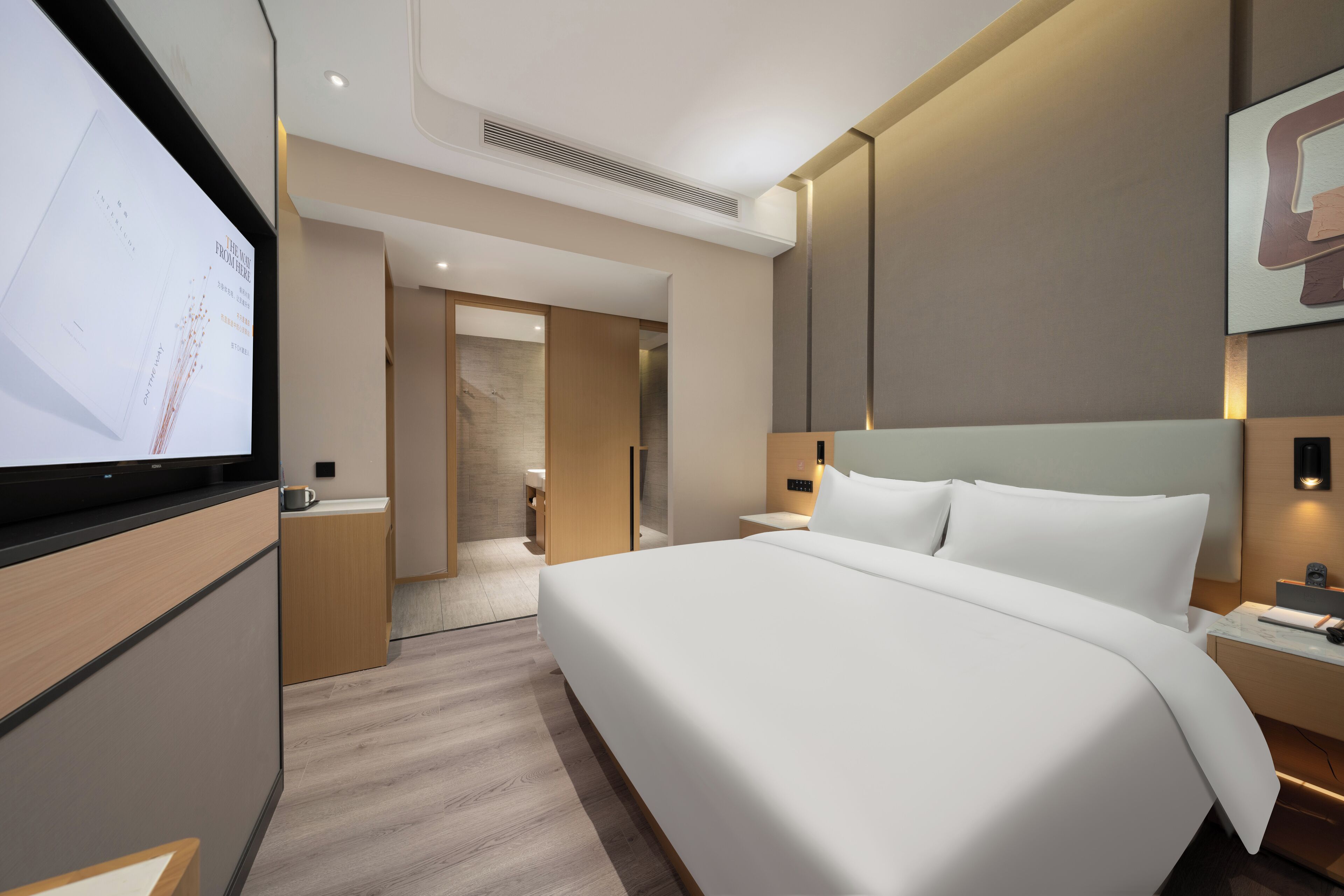 Classic Twin Room | Down comforters, desk, laptop workspace, blackout drapes