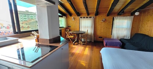 Penthouse-loft with natural light and sun all day overlooking the city center.