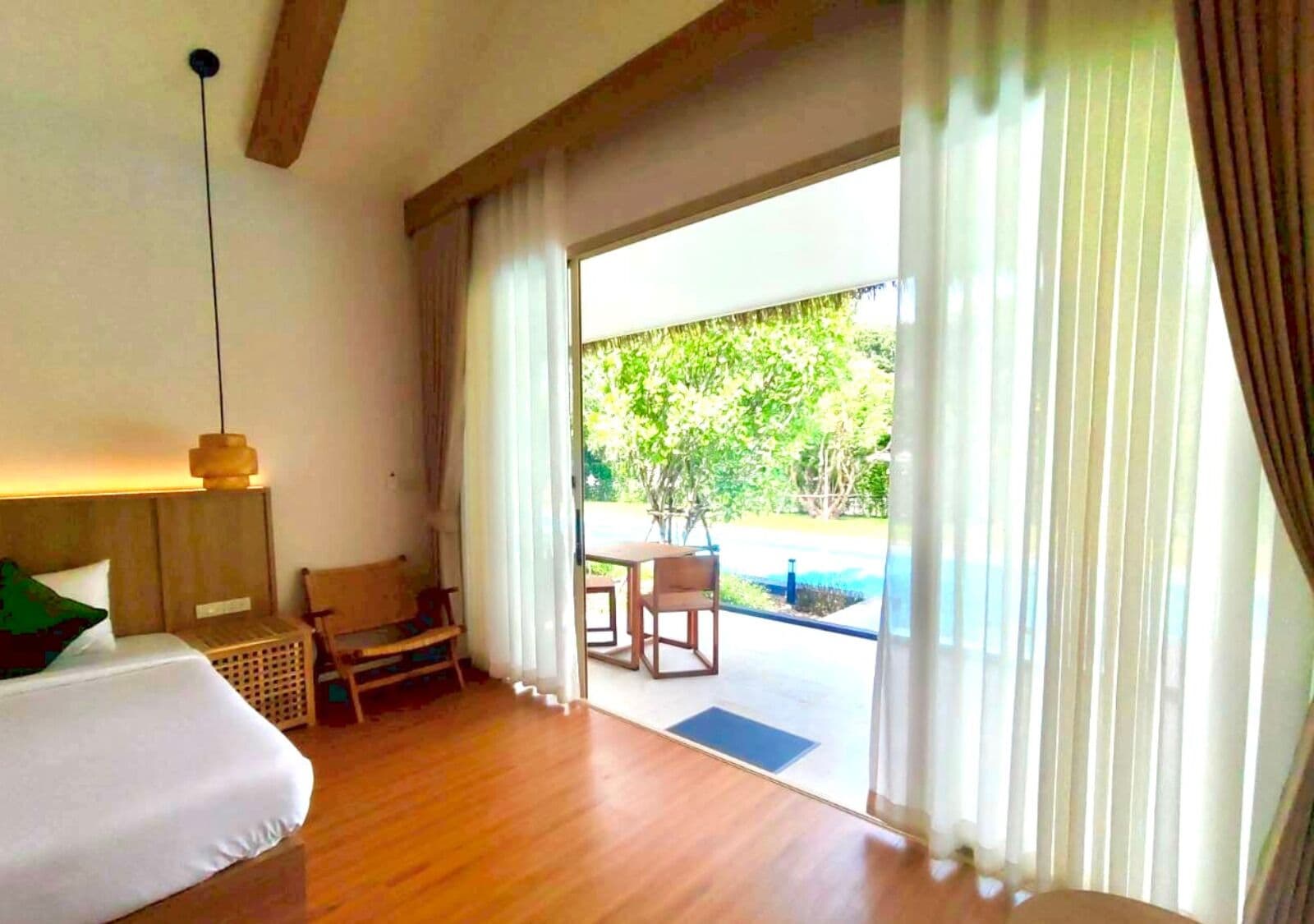 Deluxe Room, 1 Bedroom, Pool View, Ground Floor | Desk, laptop workspace, free WiFi, bed sheets