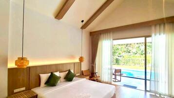 Deluxe Room, 1 Bedroom, Pool View, Ground Floor | Desk, laptop workspace, free WiFi, bed sheets