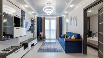 Comfort Apartment, Courtyard View | Living area | 40-inch LCD TV with cable channels