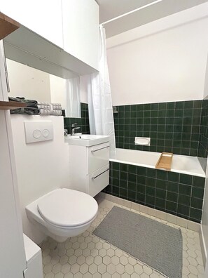 Hair dryer, towels, toilet paper