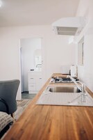 Studio | Private kitchen | Fridge, microwave, stovetop, electric kettle