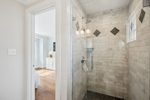 Shower, towels, soap, toilet paper