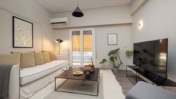 Deluxe Apartment, Balcony | Living area