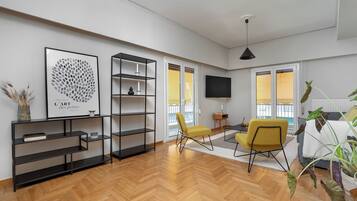 Apartamento Deluxe, balcón | Zona de estar