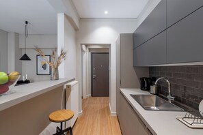 Deluxe Apartment, Balcony | Iron/ironing board, free WiFi