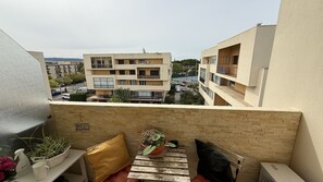 Studiolejlighed - balkon - delvis søudsigt | Udsigt fra balkon