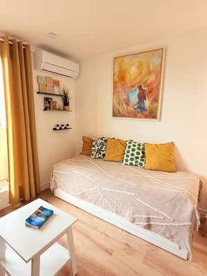 Studio, Balcony, Partial Lake View | Iron/ironing board, free WiFi