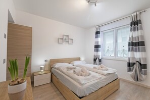 Apartemen Keluarga, beberapa kamar (Thomas's House) | 3 kamar tidur, setrika/meja setrika, Wi-Fi gratis, dan seprai linen