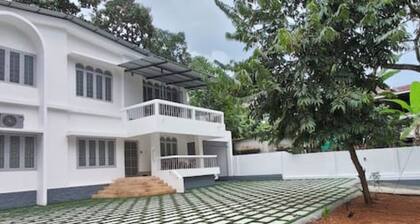 Genesis spaces AC upto 4 guests Kottayam