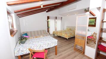 Studio, Patio | Living area | 50-cm flat-screen TV with satellite channels