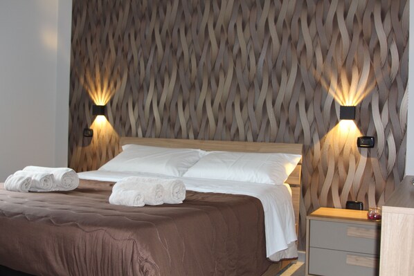 1 bedroom, desk, iron/ironing board, travel crib