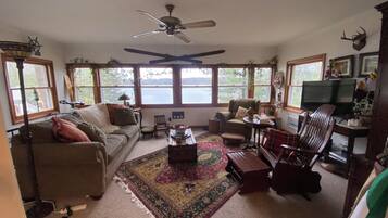 Smart TV, DVD player, foosball, books