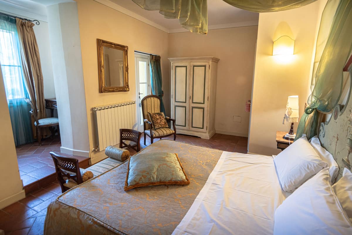 Family Room | Premium bedding, down comforters, individually furnished, desk