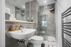 Apartment | Bathroom | Shower, deep soaking tub, hair dryer, towels