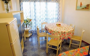 Apartment, 2 Bedrooms, Balcony | Dining room - Beachside Flat in a Residence With Swimming Pool and Garden (Lignano Sabbiadoro)