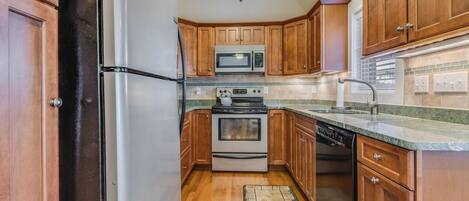 Cottage, Multiple Beds, Patio, Garden View (DELAWARE AVENUE 34B) | Private kitchen | Coffee/tea maker, dining tables