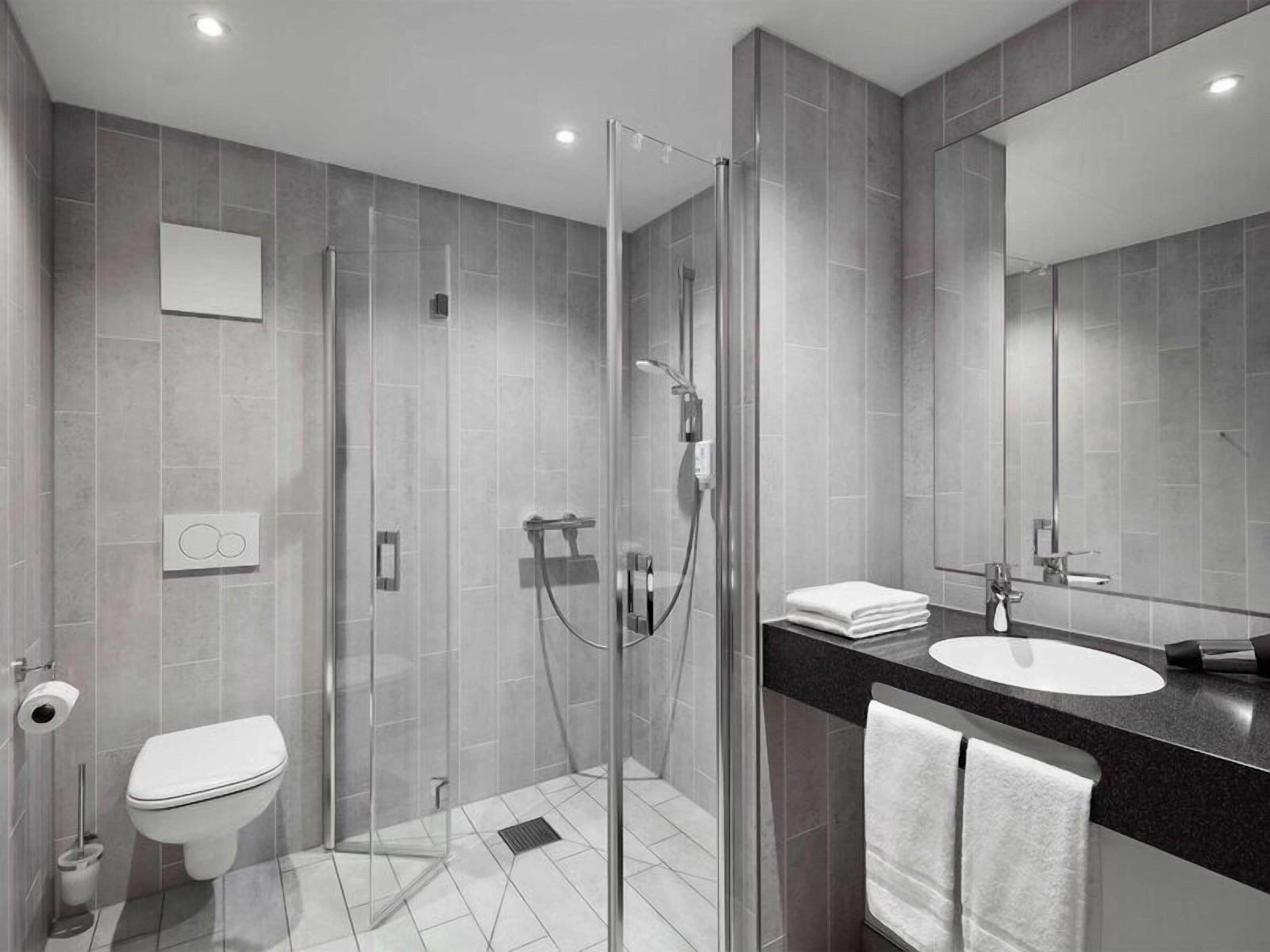 Family Quadruple Room | Bathroom | Hair dryer, towels, soap, shampoo