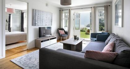 Peaceful countryside apartment near Ålesund. Fjord & Mountain views & garden