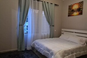 2 dormitorios, tabla de planchar con plancha, wifi y ropa de cama