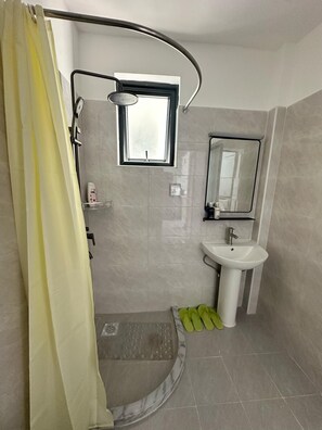 Bidet, towels, soap, shampoo