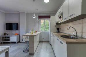 Apartment | Private kitchen | High chair - Beachfront Apartment in Playa de Mogan (Mogan)